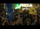 Supporters of Argentina's Milei celebrate partial poll results