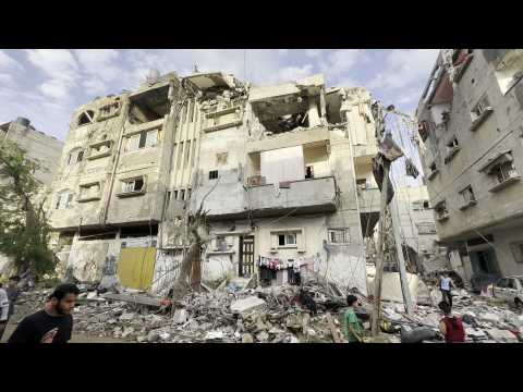 Palestinians inspect damage after Israeli strikes on Khan Yunis