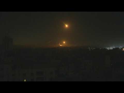 Flares and explosions light up the sky of Gaza