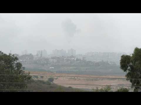 The Gaza Strip, pounded by Israeli artillery, under clouds of smoke