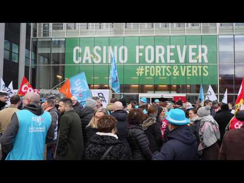 Employees protesting potential dismantling at French Food retailer Casino's HQ