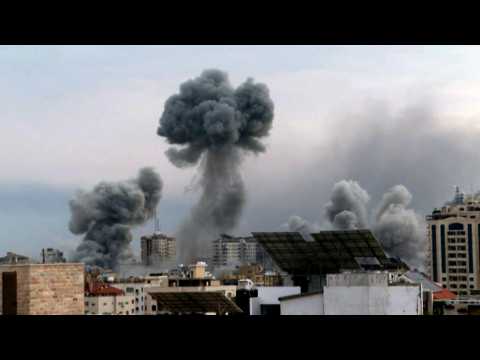 Smoke billows from buildings in Gaza City following Israeli strikes