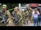 Salvadoran troops besiege city in hunt for alleged gang members