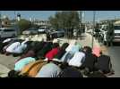 Palestinians pray in street after being forbidden entrance to al-Aqsa