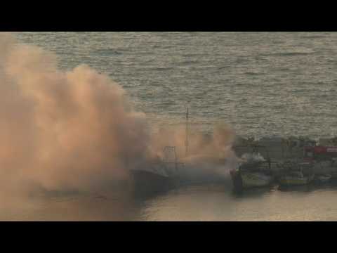 Smoke billows after Israeli strike on Gaza port