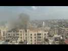 Israeli forces fire warning shot on a building in Gaza City