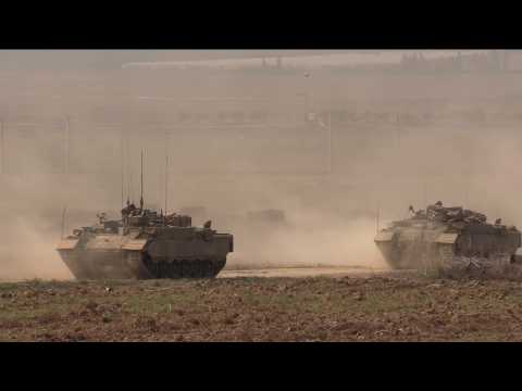 Israeli military vehicles mobilise on Gaza border