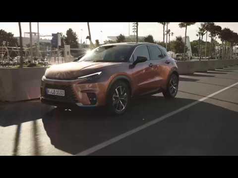 The new Lexus LBX in Sonic copper bi-tone Driving Video