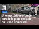 Une mystérieuse fumée sort de la piste cyclable du Grand Boulevard
