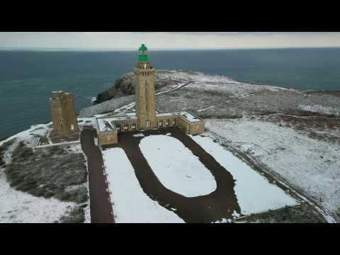 Cap Frehel lighthouse in Brittany covered in snow