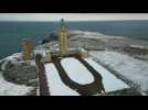Cap Frehel lighthouse in Brittany covered in snow
