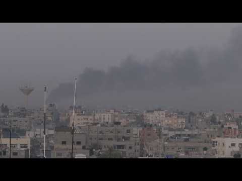 Smoke rises over Khan Yunis as seen from Rafah