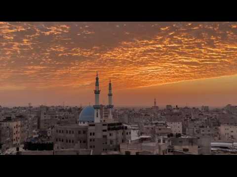 Sunset over Gaza Strip during call to prayer