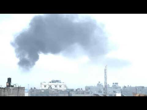 Smoke billows over Gaza's Khan Yunis on Tuesday morning