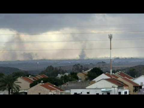 Plumes of smoke over Gaza seen from Israel