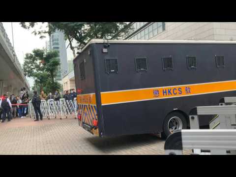 Police vans arrive at Jimmy Lai trial