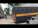 Police vans arrive at Jimmy Lai trial