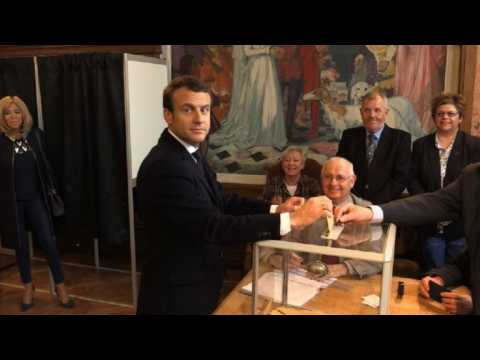 Macron casts his vote in presidential run-off