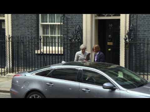 Theresa May leaves Downing Street after DUP talks