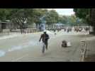 Police on motorbikes chase down protesters in Caracas - Label : AFPTV - First images - Category : News