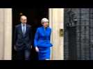 Theresa May leaves Downing St to meet Queen