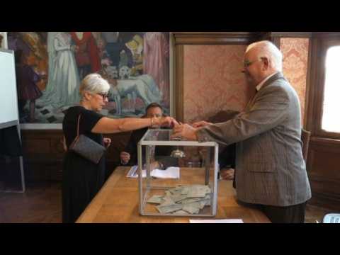 Voting continues in France to choose new parliament