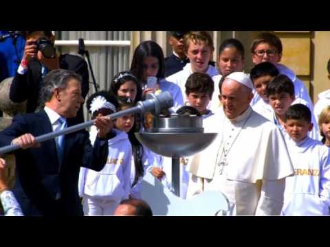 Pope Francis and Colombian president set flame of peace alight