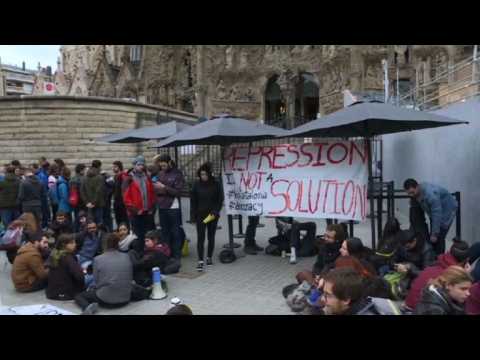 Protesters gather in front of the Sagrada Família