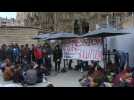 Protesters gather in front of the Sagrada Família