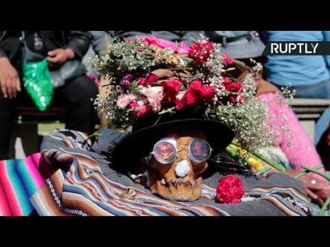 People Mourn Dead Relatives By Dressing Up Real Human Skulls for ‘Day of the Natitas’