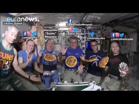 Watch: Italian astronaut Paolo Nespoli shares a pizza home with ISS crew