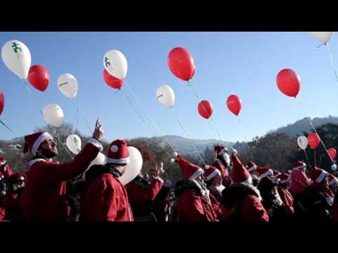 Thousands take part in Santa Claus rally in Turin, Italy