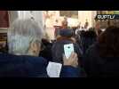 Father, Son and Holy SIRI? Italian Priest Blesses Mobile Phones at Mass