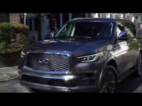 2018 INFINITI QX80 in Graphite Shadow Driving in the City