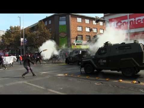 Protesters clash with riot police in Chilean May Day protest