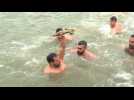 Greek Oxthodox men dive for cross in Golden Horn in Istanbul