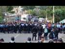 Honduran migrants cross into Guatemala despite police barrier