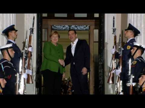 Merkel visits Athens to promote post-austerity ties