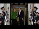 Merkel visits Athens to promote post-austerity ties