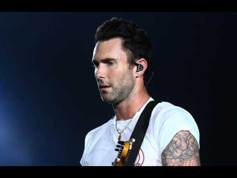 Maroon 5's Adam Levine delivers energetic Super Bowl halftime show