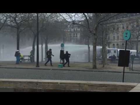 Clashes erupt as France's 'yellow vests' stage fresh protests