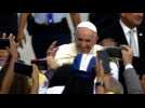 Pope Francis breaks protocol, greets faithful at Panama airport