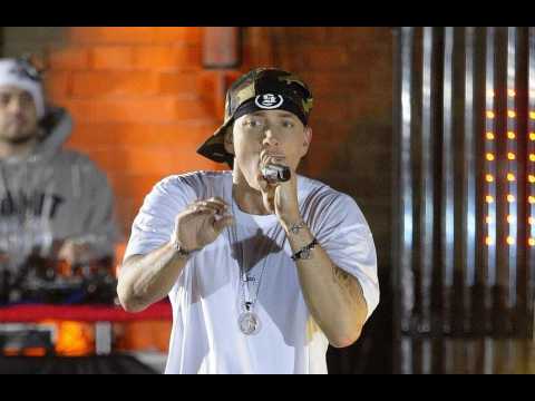 Eminem slammed for using gunshot sound on stage