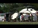 Thailand police transfer patient from helicopter to ambulance