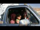 Hundreds of Syria refugees return home from Lebanon border town