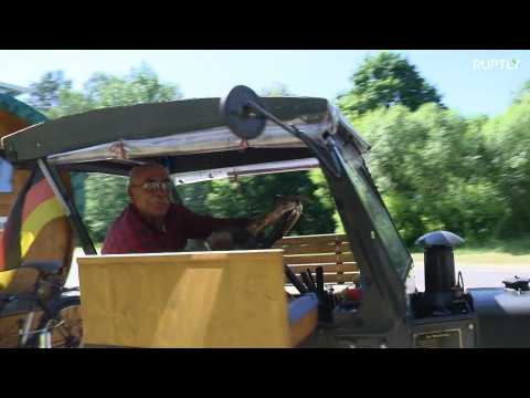 Meet the grandpa who's driving from Germany to Russia in an old tractor!