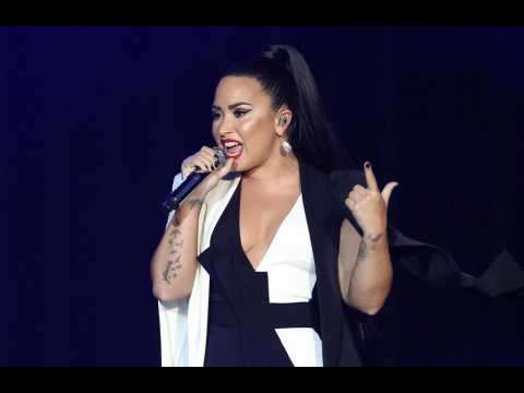 Demi Lovato says she's 'a new person' after emotional performance