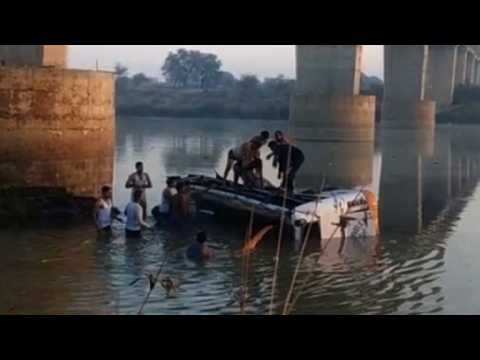 At least 32 dead as bus plunges off bridge in India