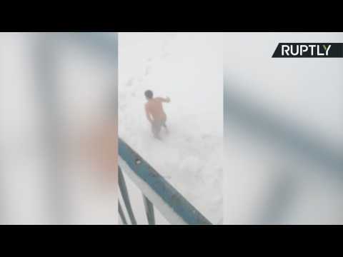 Daredevils Try 'Extreme Diving' After Blizzard Dumps Yard of Snow