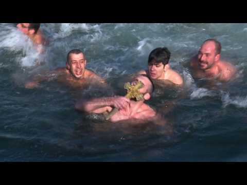 Swimmers plunge into Istanbul's icy Bosphorus for Epiphany